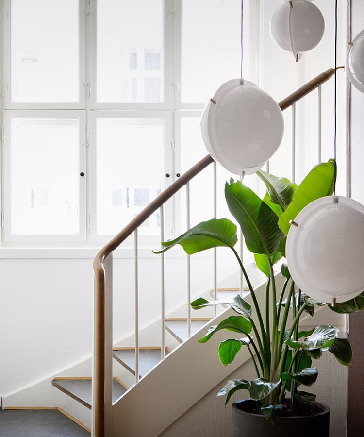 Listed staircase in an office hotel in Copenhagen with original windows